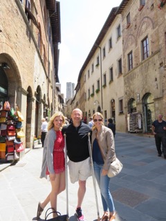 Greg and his daughters in Italy